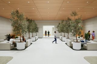 Apple Park Observatory in California, showing flowing, curved lines and a semi buried structure into a hill